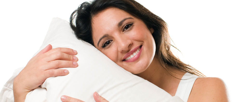 Woman holding pillow